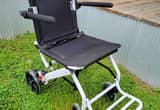 Brand new in the box foldable wheelchair